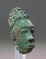 Pendant representing a human head, Igbo-Ukwu, 9th - 10th century